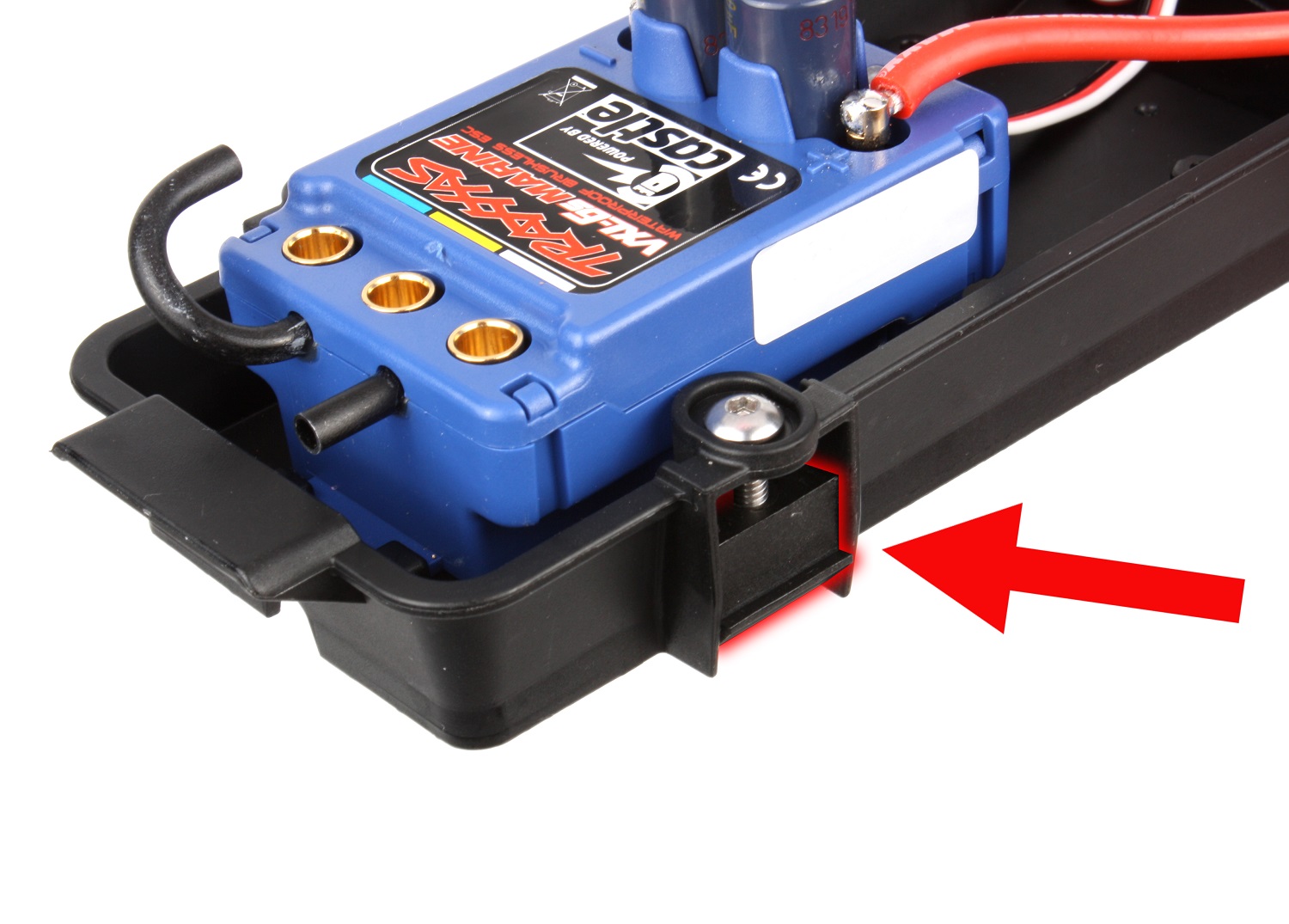 Loosen the two tray screws