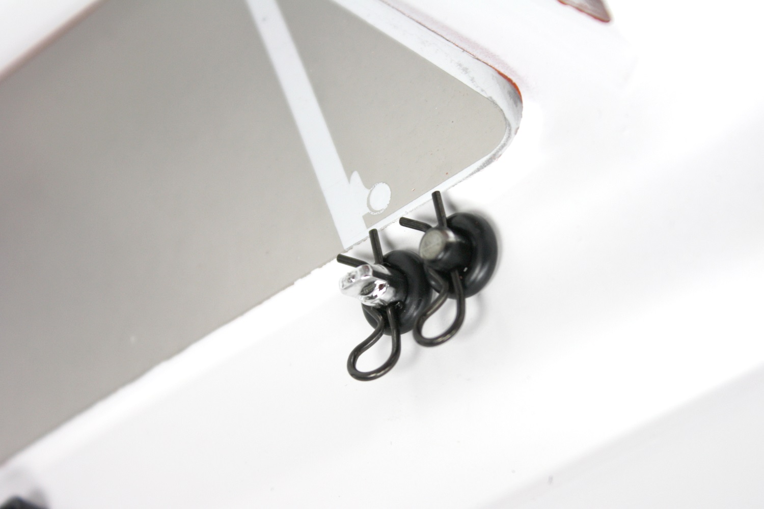 Remove the old clips and mirrors