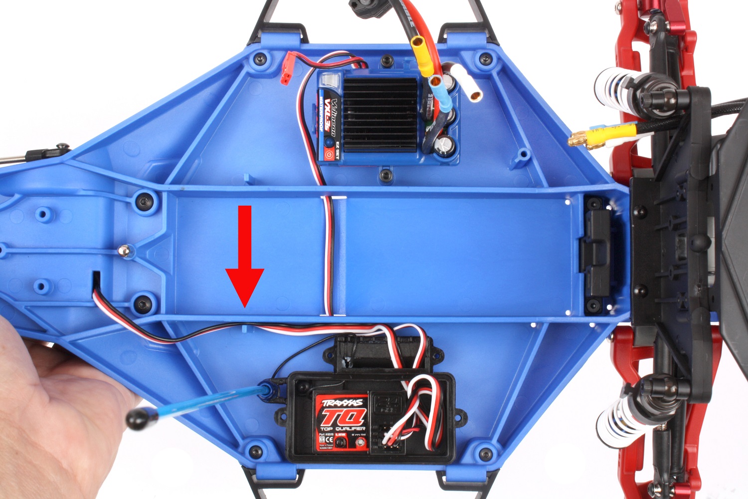 Route the wires through the chassis