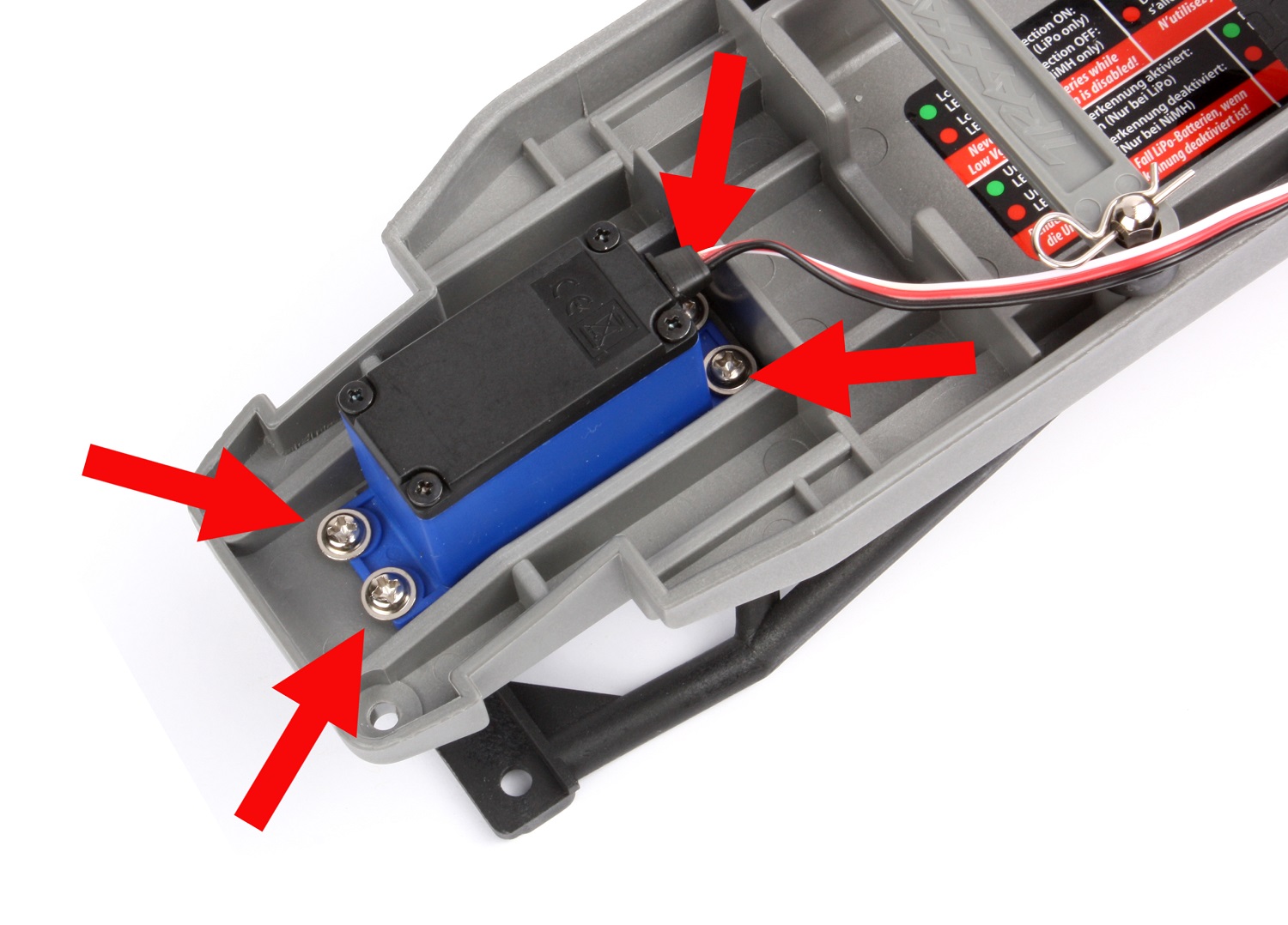 Four screws secure the servo