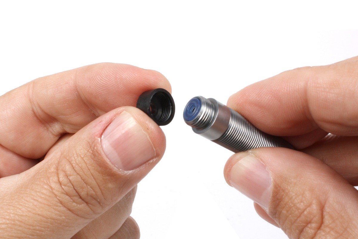 Unscrew the lower cap to access the seals