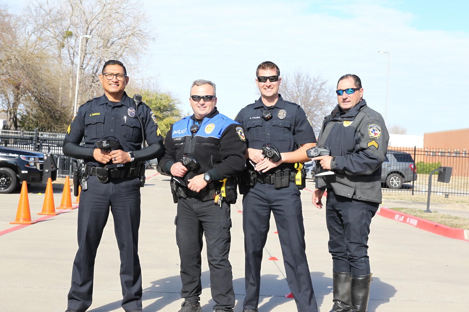 McKinney Officers with trucks