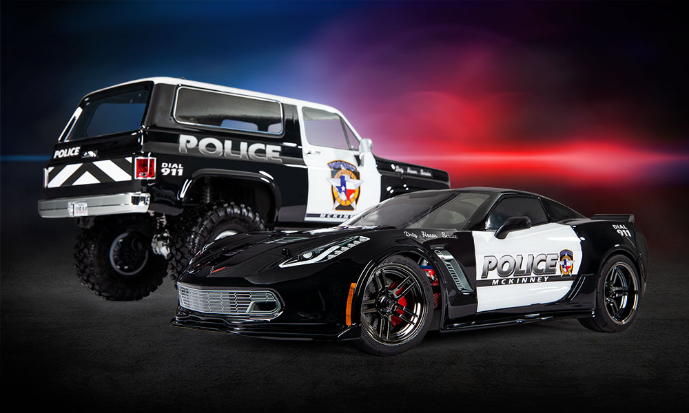 Police Blazer and Corvette