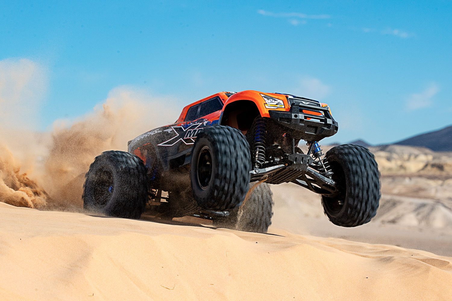 Orange X-Maxx sand dune front view