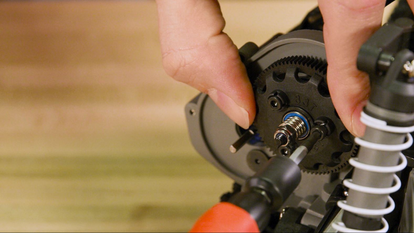 Attach the new spur gear