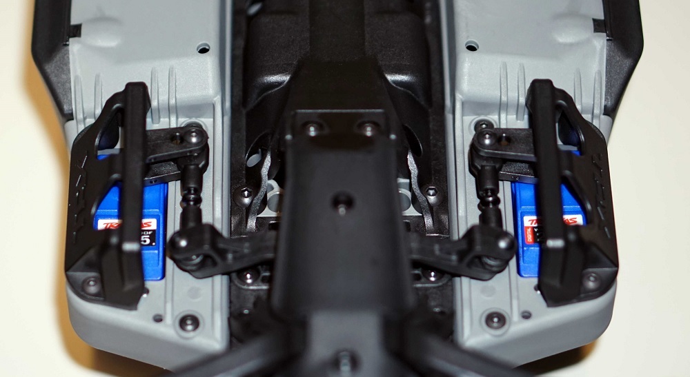 Turn the truck over to access servos