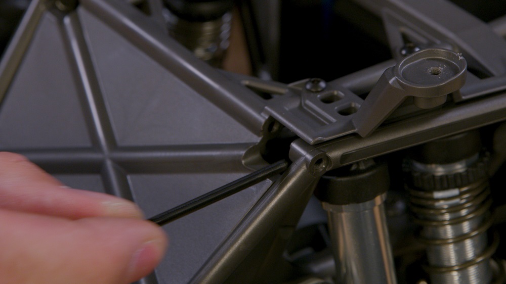 Remove the shock screw
