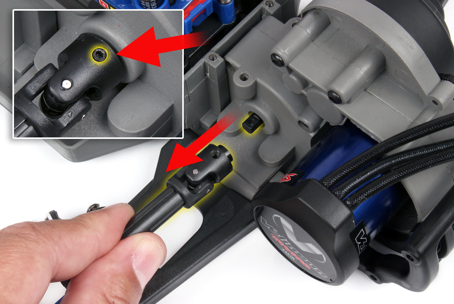 Remove the screw pin, then slide the shaft half off the transmission.