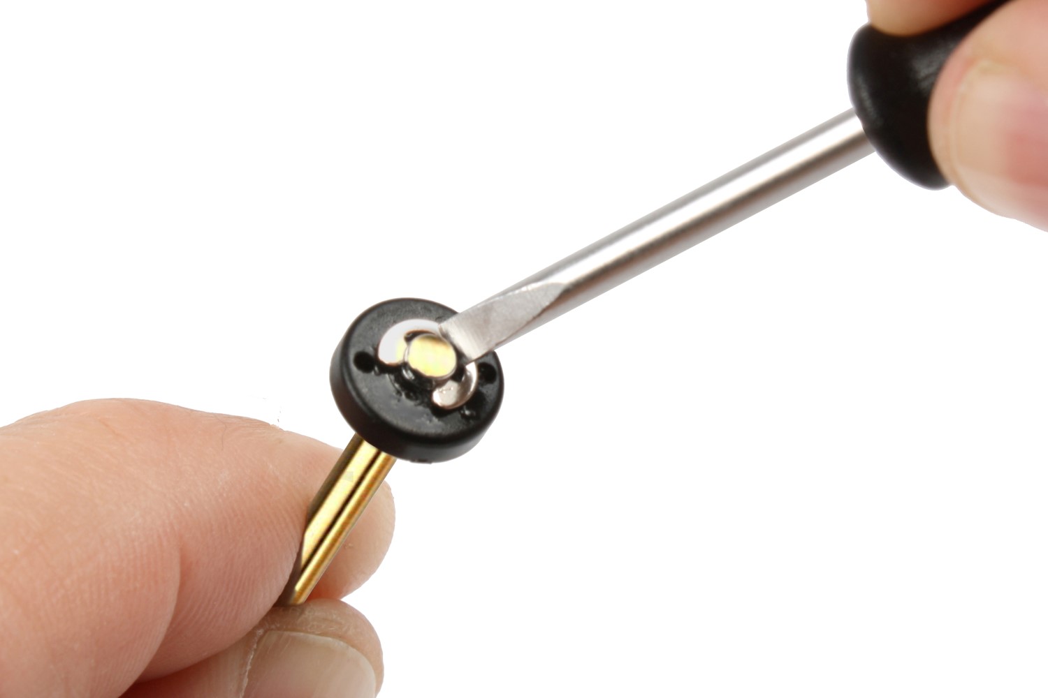 Twist the screwdriver to pop off the e-clip