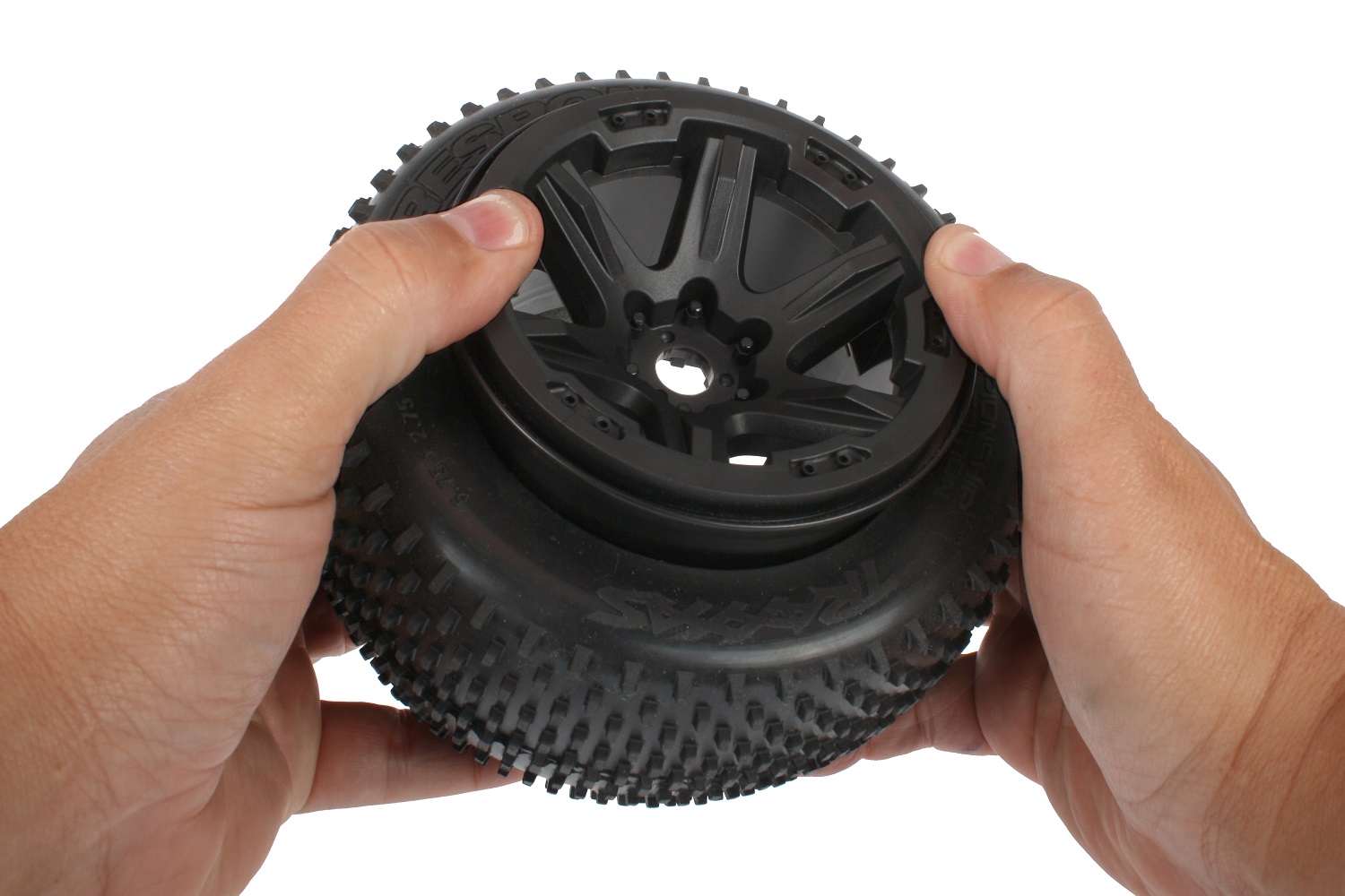 Push and pull the tire over the rim